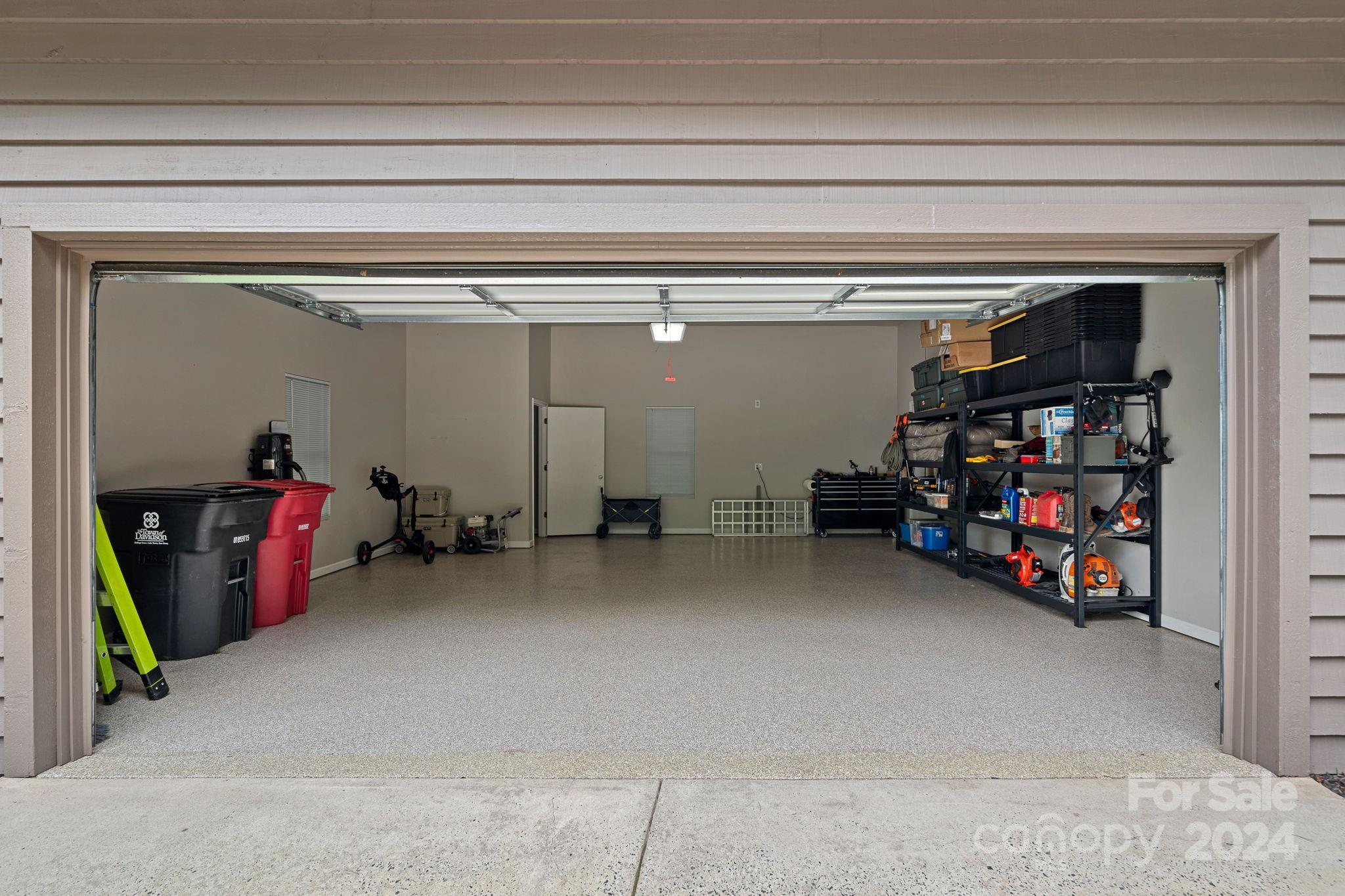 345 Jib Court Davidson, NC 28036 - Photo 34 of 40 a view of a garage with rack and bicycle