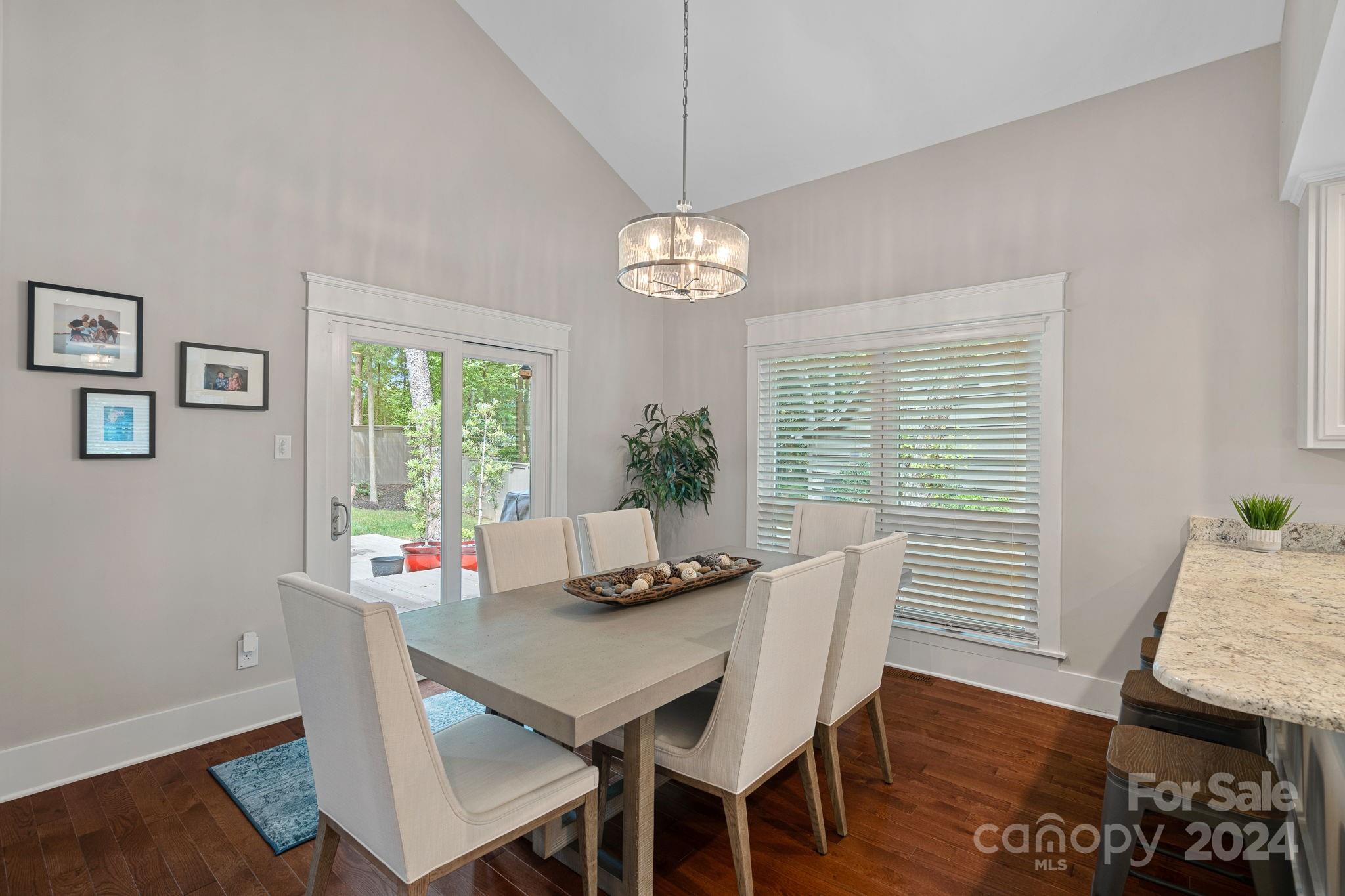 345 Jib Court Davidson, NC 28036 - Photo 9 of 40 a dining room with furniture and window