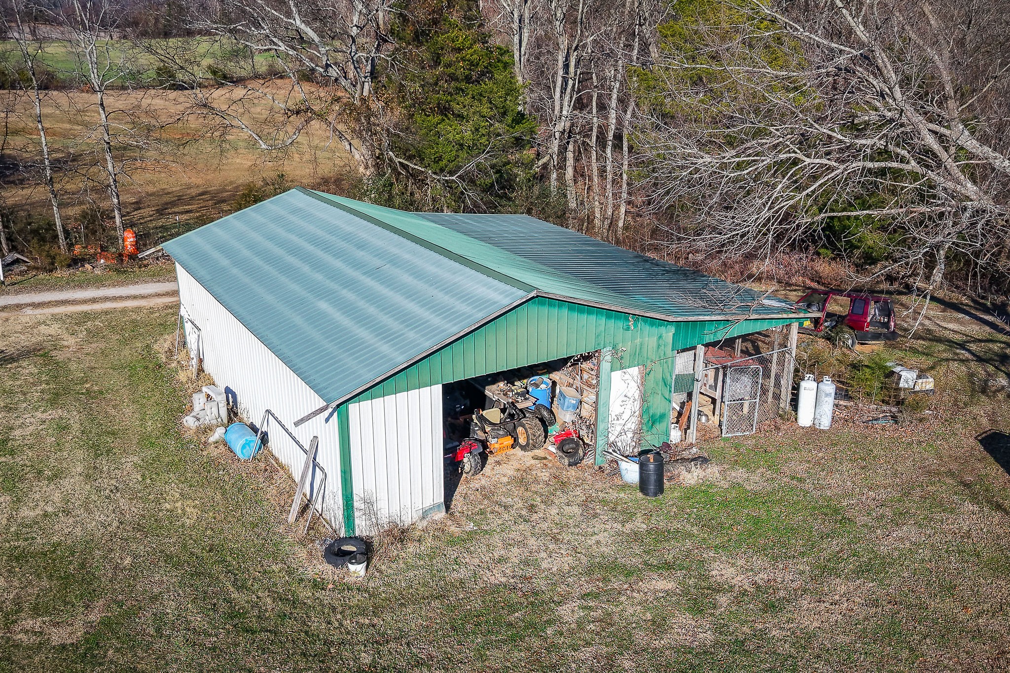 505 Thaxton Road McMinnville, TN 37110 - Photo 16 of 31 a view of a house with a yard and tree