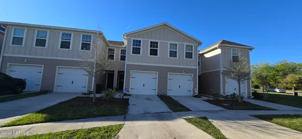a front view of house with yard