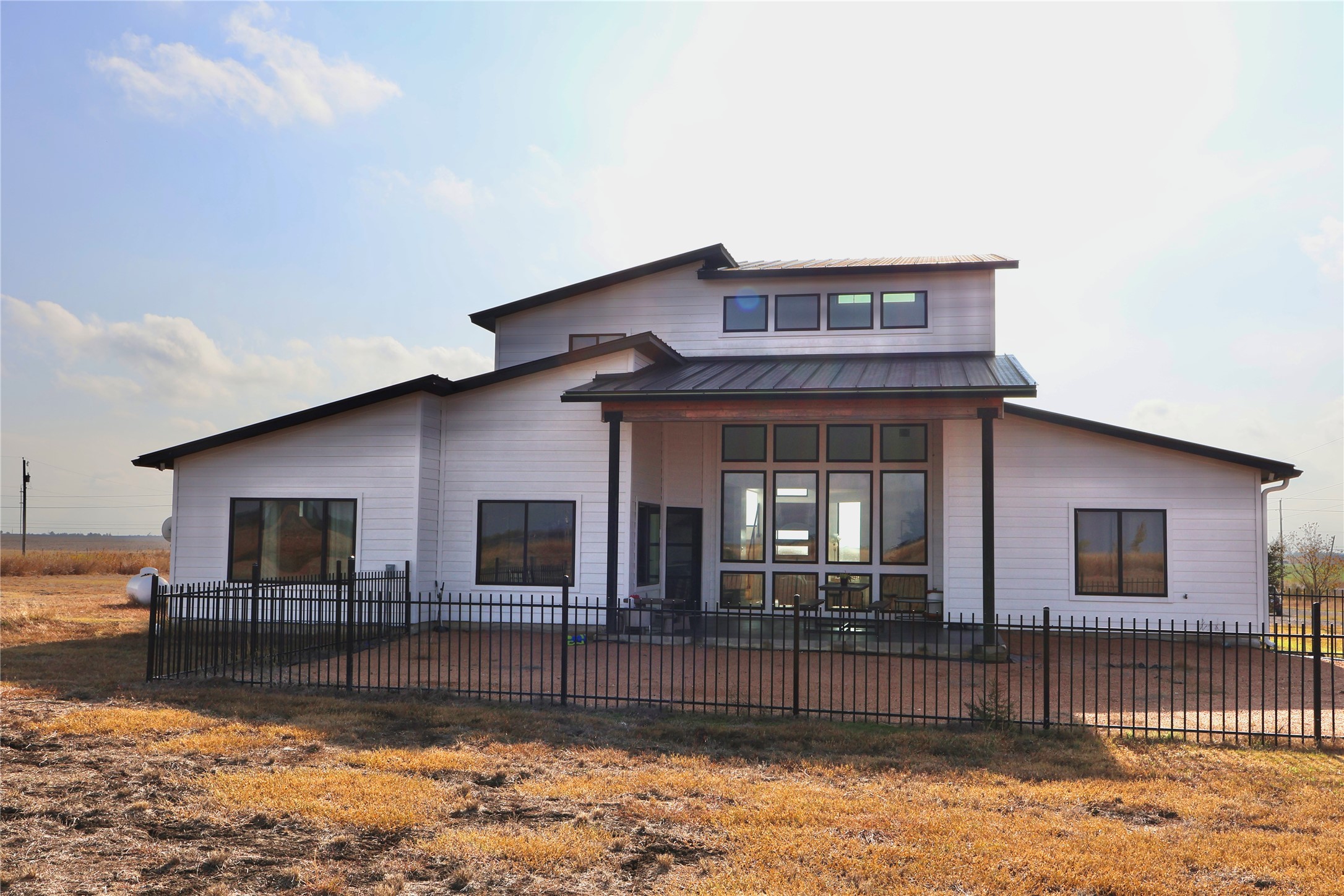 17216 Lund - Carlson Road Elgin, TX 78621 - Photo 15 of 17 View of front of property with a patio area and a metal roof