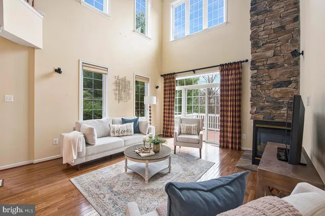 a view of a livingroom with wooden floor
