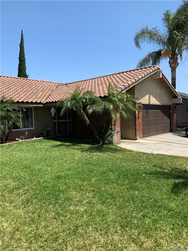11299 Cochran Avenue Riverside, CA 92505 - Photo 1 of 1 a front view of a house with a yard
