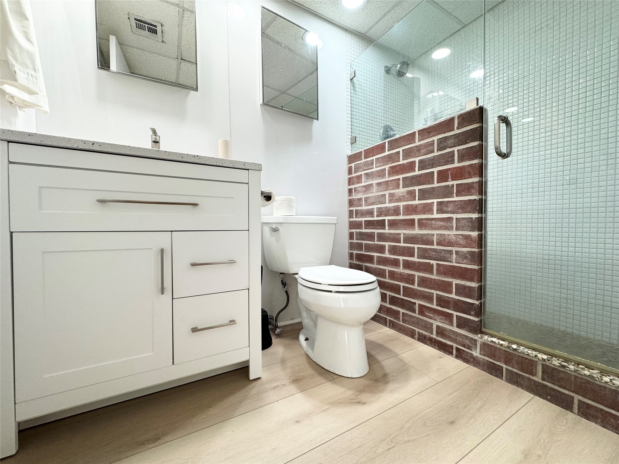1800 Lavaca Street, Unit 705 Austin, TX 78701 - Photo 14 of 18 a bathroom with a toilet and a sink