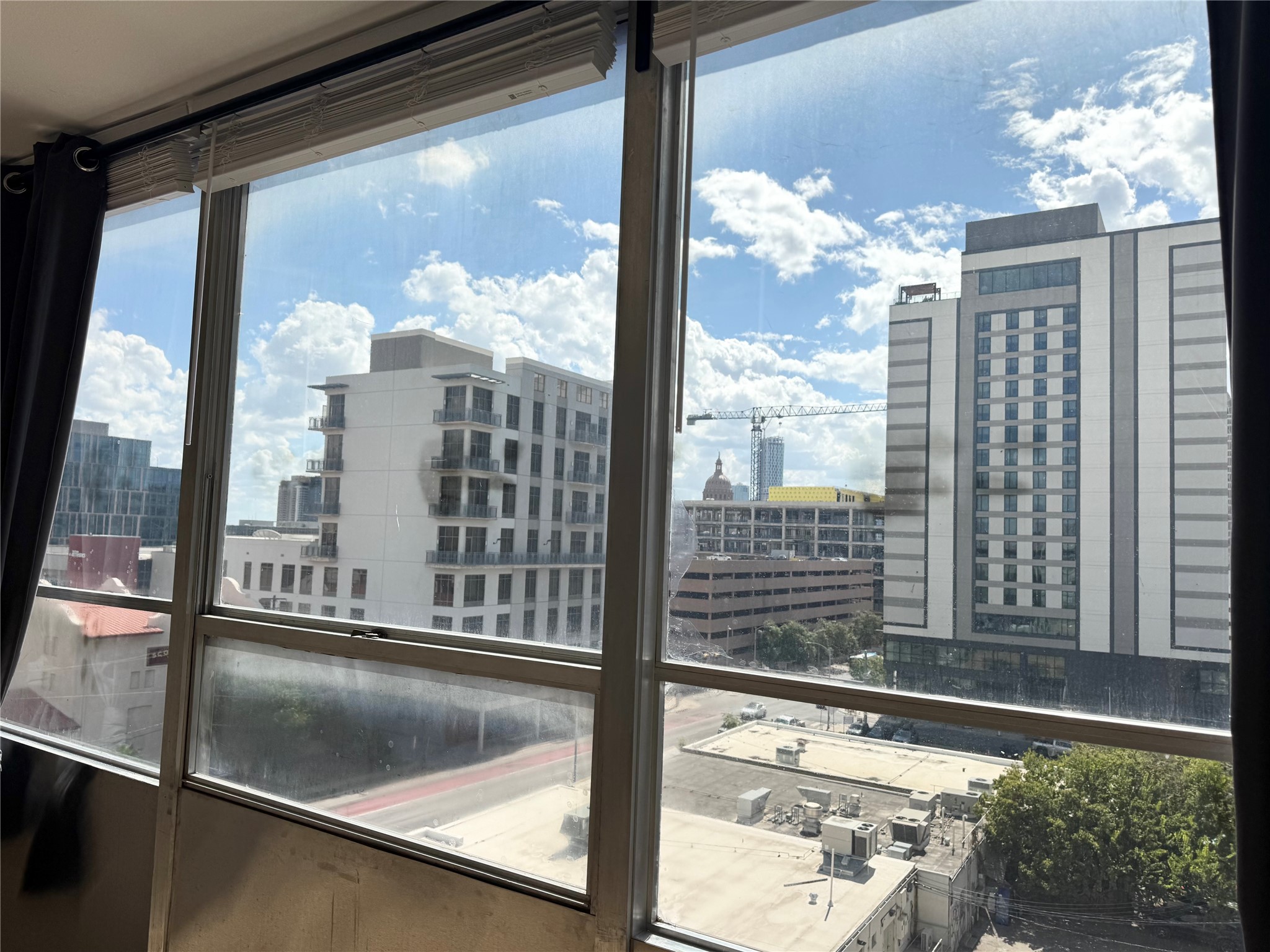 1800 Lavaca Street, Unit 705 Austin, TX 78701 - Photo 3 of 18 a view of a building from a window