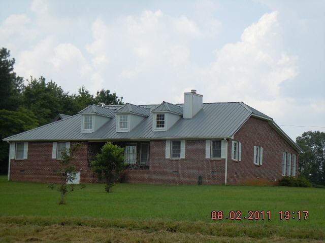 65 Richard Pullen Road Cedartown, GA 30125 - Photo 1 of 1 a front view of a house with a yard