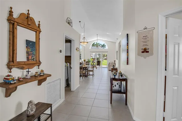 a lobby with furniture and wooden floor