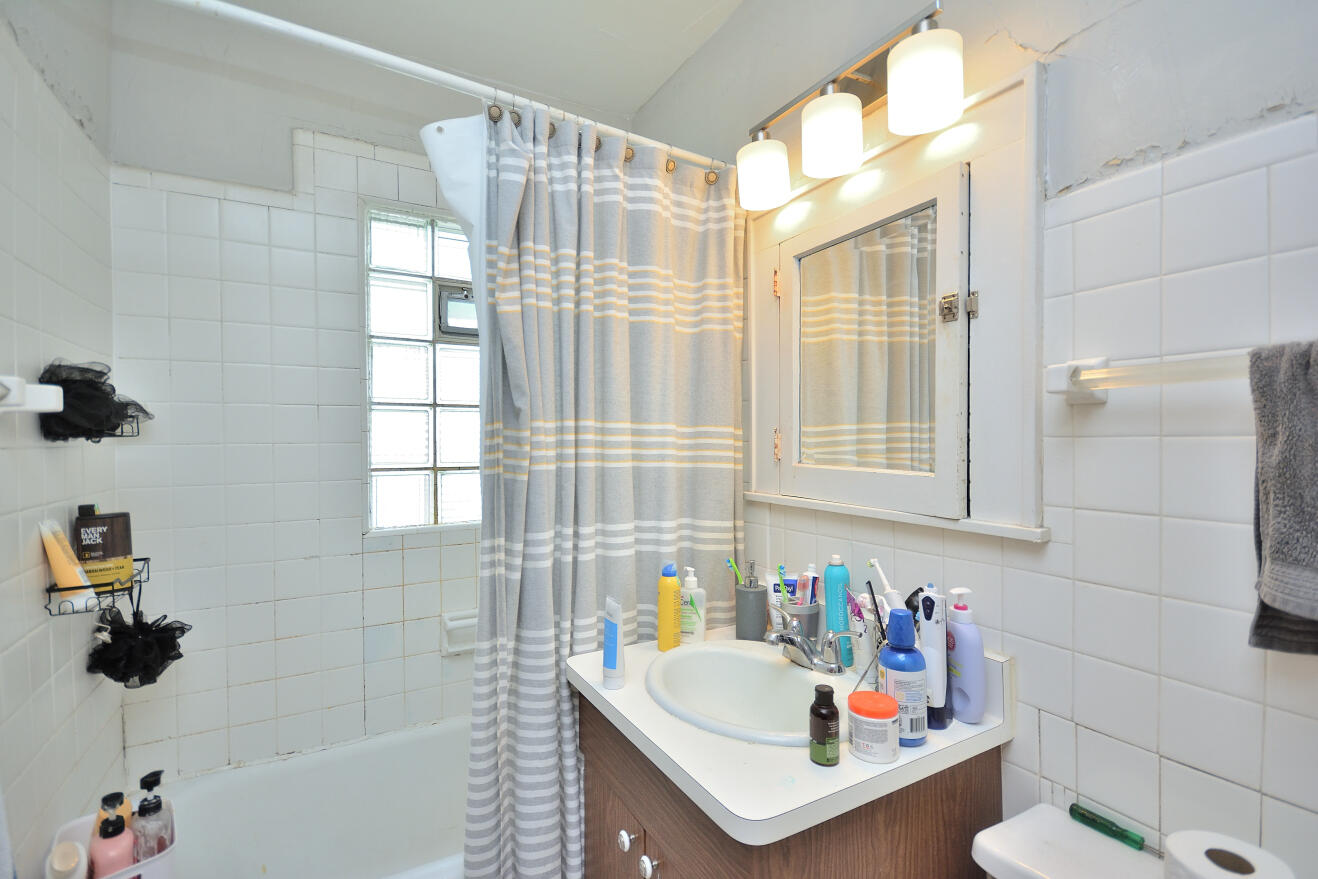 3316 North Cramer Street, Unit 3318 Milwaukee, WI 53211 - Photo 37 of 42 Lower Bathroom