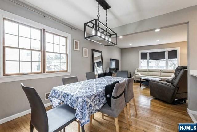 23 Asmus Road Closter, NJ 07624 - Photo 7 of 38 a view of a dining room with furniture window and wooden floor