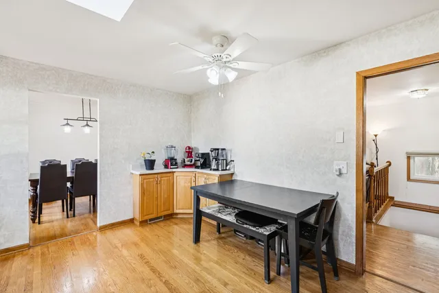 a workspace with furniture and wooden floor