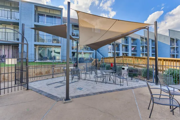 a view of a building with sitting area