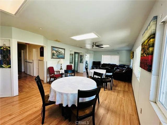 a kitchen with a stove sink and cabinets
