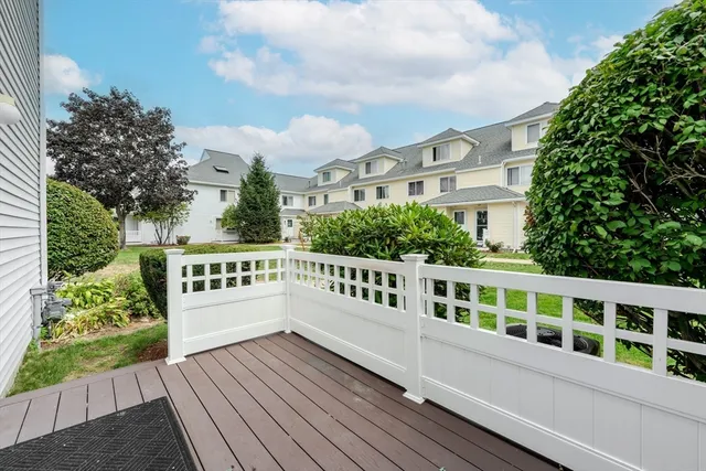 a balcony with view of an outdoor space