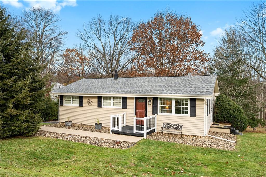 125 Lovi Road Baden, PA 15005 - Photo 1 of 25 front view of a house with a yard