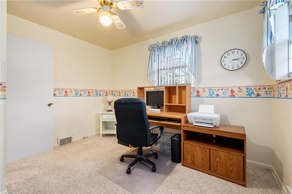 125 Lovi Road Baden, PA 15005 - Photo 15 of 25 a view of a workspace with furniture and a window