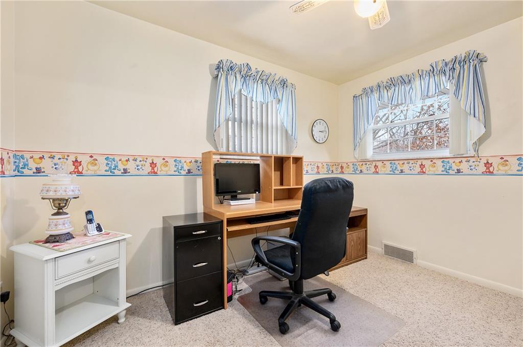 125 Lovi Road Baden, PA 15005 - Photo 16 of 25 a view of a workspace with furniture and a window