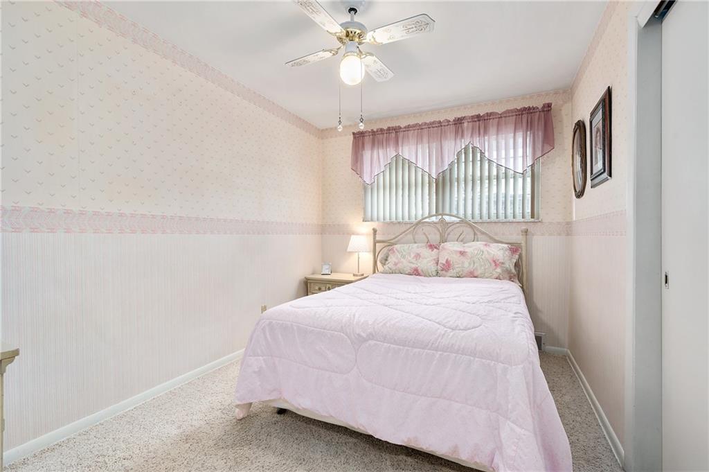 125 Lovi Road Baden, PA 15005 - Photo 17 of 25 a bedroom with a bed and a window