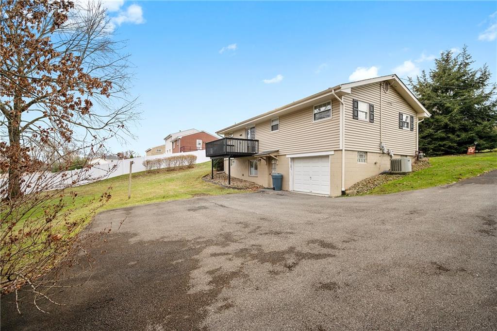 125 Lovi Road Baden, PA 15005 - Photo 18 of 25 a view of a house with a backyard