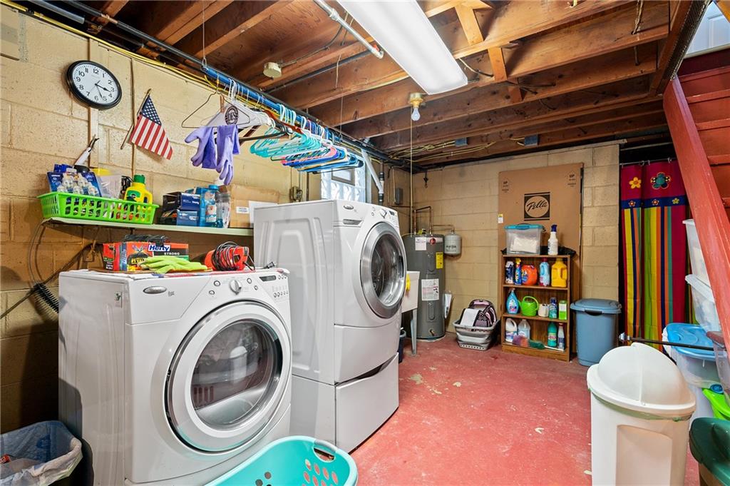 125 Lovi Road Baden, PA 15005 - Photo 22 of 25 a utility room with dryer and washer
