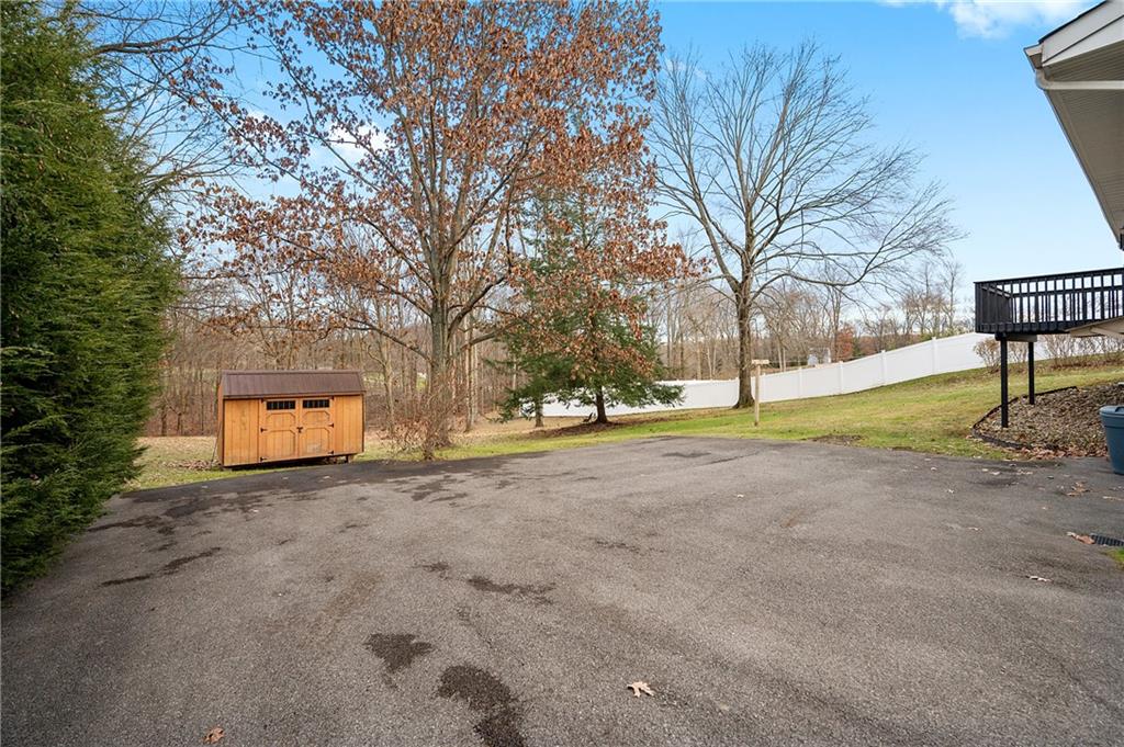 125 Lovi Road Baden, PA 15005 - Photo 25 of 25 a view of a yard with plants and trees