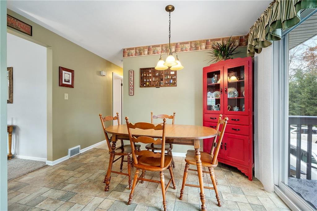 125 Lovi Road Baden, PA 15005 - Photo 5 of 25 a view of a dining room with furniture window and outside view