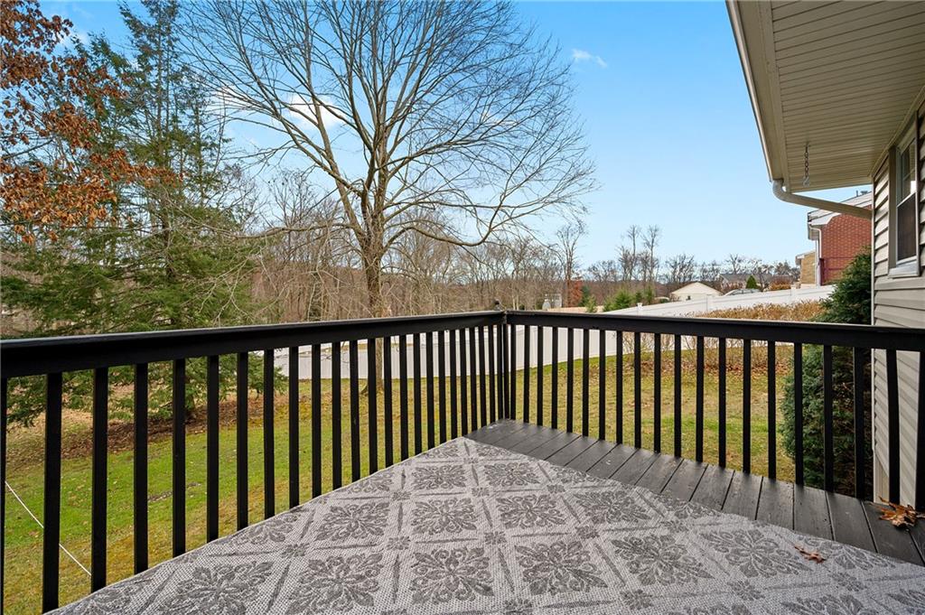 125 Lovi Road Baden, PA 15005 - Photo 6 of 25 a balcony with trees