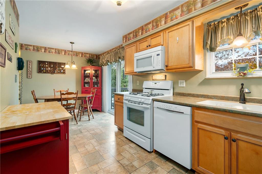 125 Lovi Road Baden, PA 15005 - Photo 8 of 25 a kitchen with stainless steel appliances granite countertop a sink and cabinets