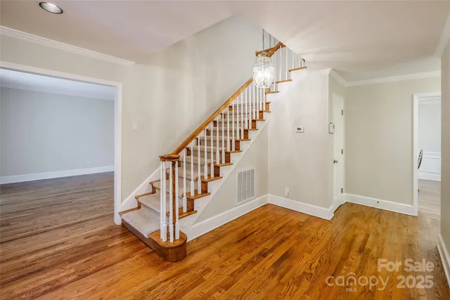 a view of entryway with wooden floor