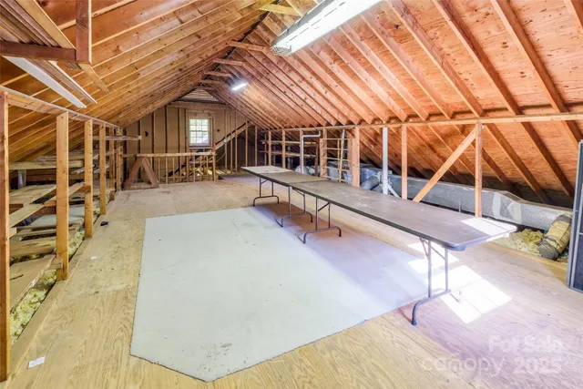 a view of a patio with table and chairs