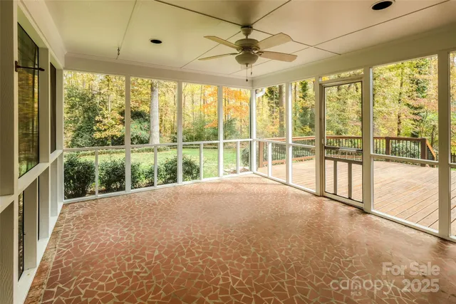 a view of an empty room with a large window