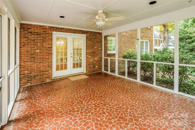 en empty room with windows