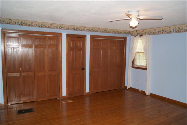 460 South Ray Road Portland, TN 37148 - Photo 11 of 20 Master bedroom also has wood flooring.