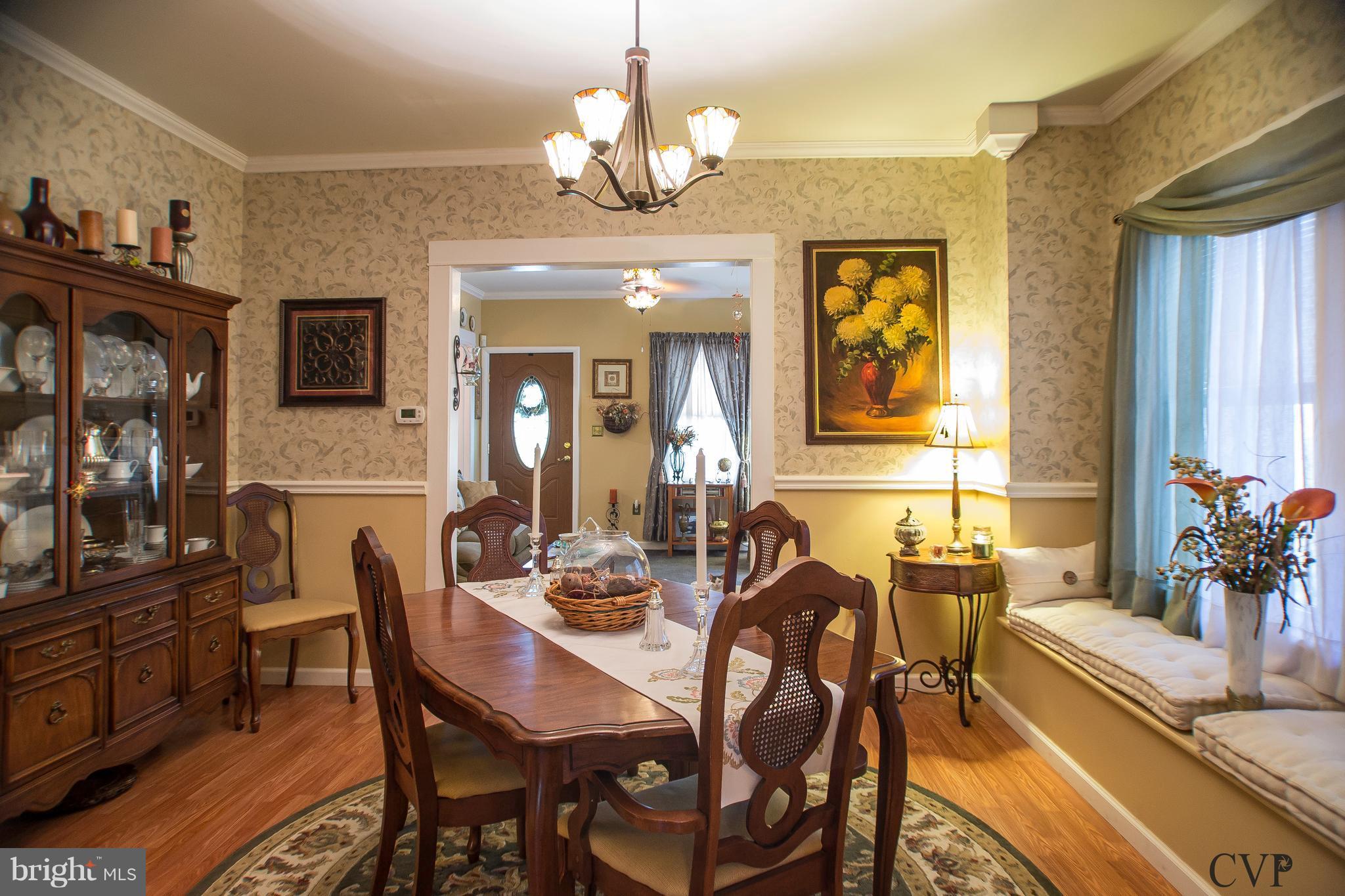 903 Braddock Road Cumberland, MD 21502 - Photo 9 of 27 Beautiful dining room w/window seat and hw floor