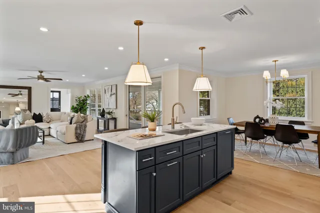 a bathroom with a shower a toilet and a sink