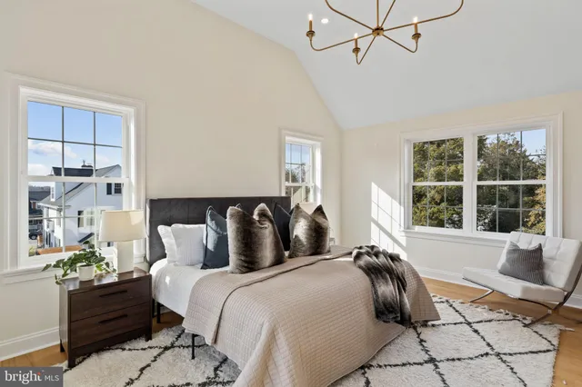 a bedroom with a bed and a view of bathroom