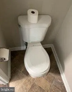 a close view of a toilet in a bathroom