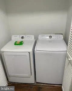 a utility room with dryer and washer