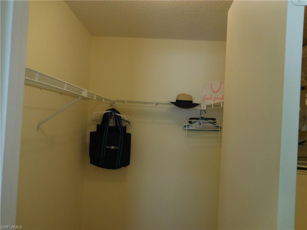 4287 27th Court Southwest, Unit 202 Naples, FL 34116 - Photo 19 of 22 a view of a air conditioner in a shelf