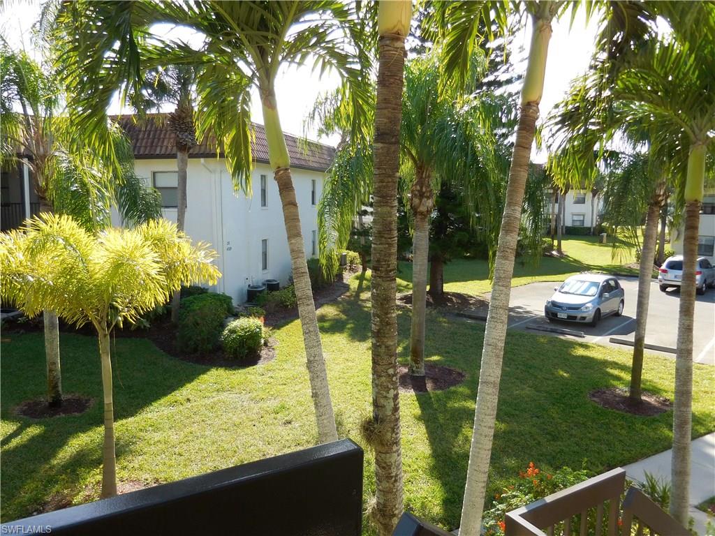 4287 27th Court Southwest, Unit 202 Naples, FL 34116 - Photo 22 of 22 a view of a garden
