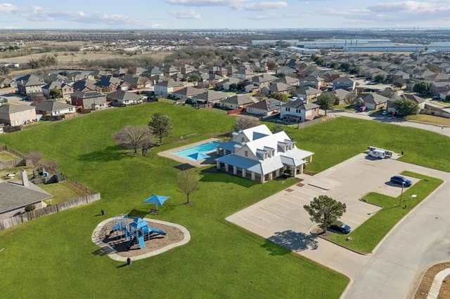 an aerial view of a house with a garden