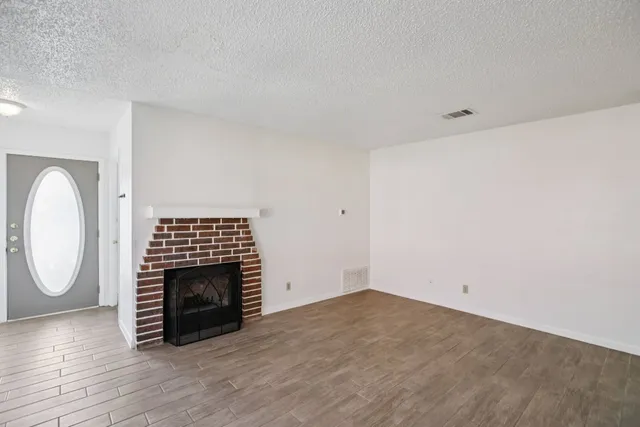 a view of a livingroom with a fireplace
