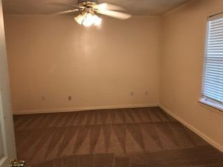 2425 25th Street Lubbock, TX 79411 - Photo 8 of 13 a view of a room with a window and a fan