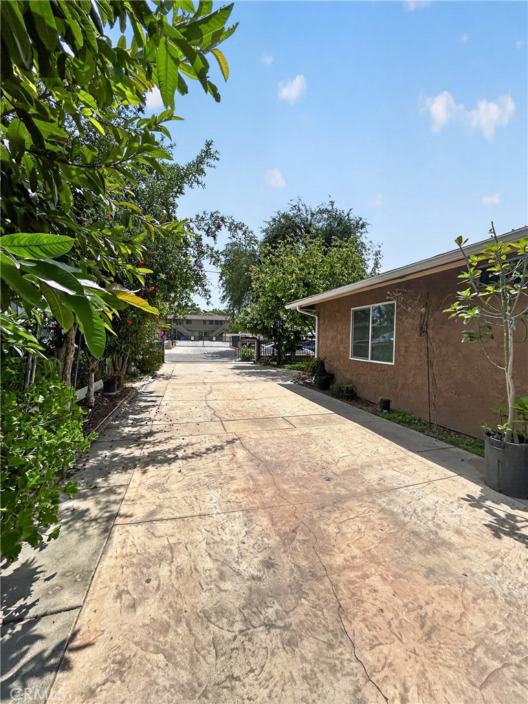 7451 Diamond Street Riverside, CA 92504 - Photo 28 of 31 a view of house with backyard and trees