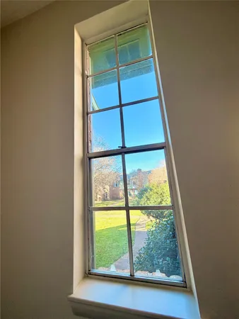 a view of a room that has a window