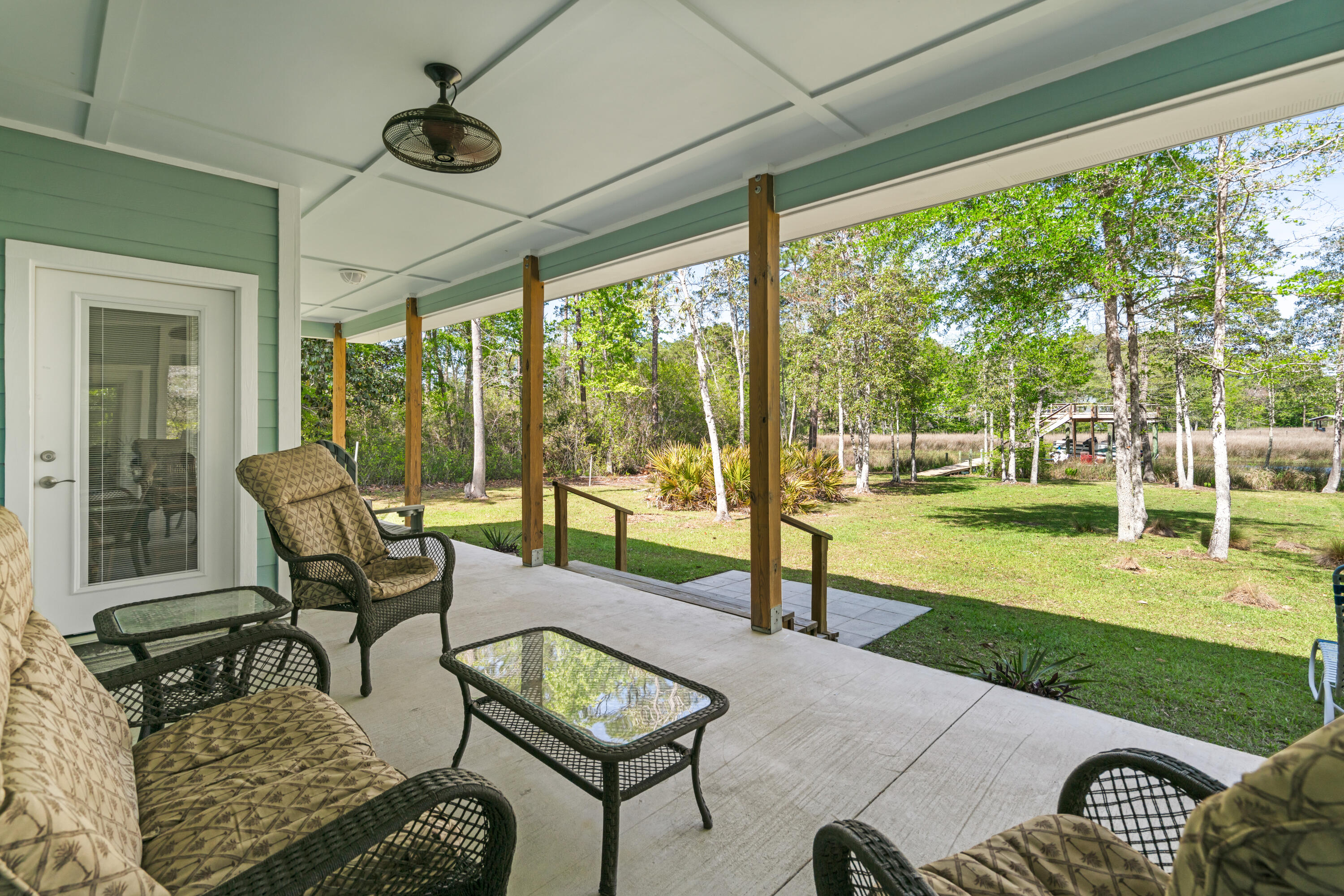 528 Bay Grove Road Freeport, FL 32439 - Photo 29 of 68 a building outdoor space with patio furniture and garden