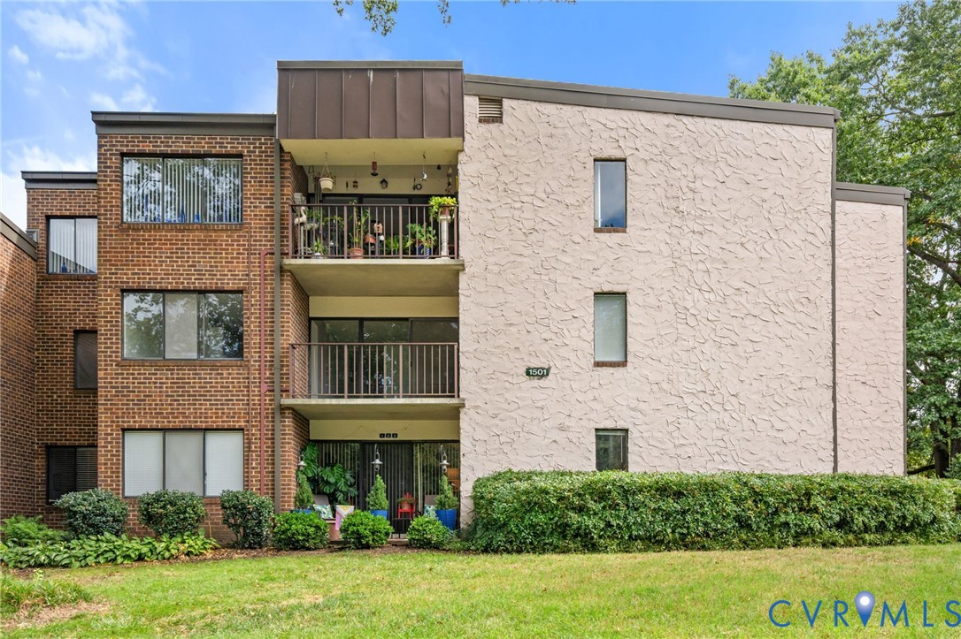 1501 Bronwyn Road, Unit 101 Henrico, VA 23238 - Photo 23 of 24 front view of a house with a yard