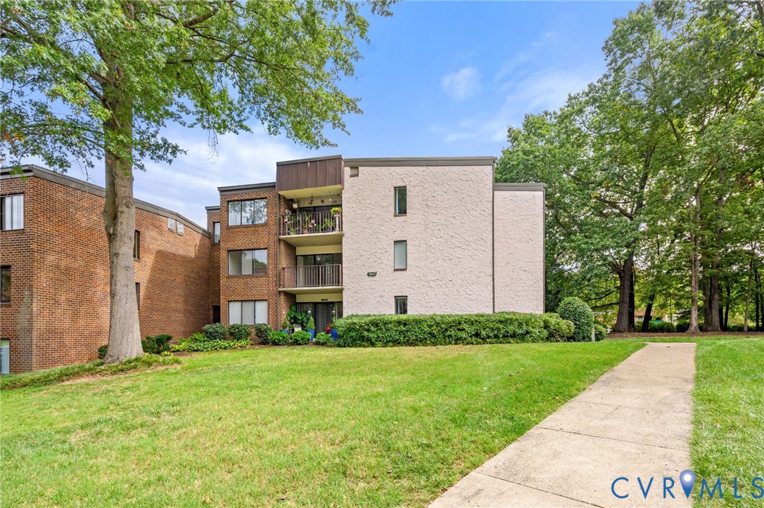 1501 Bronwyn Road, Unit 101 Henrico, VA 23238 - Photo 24 of 24 a front view of a house with garden