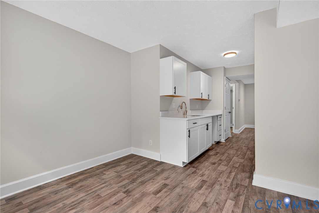 1501 Bronwyn Road, Unit 101 Henrico, VA 23238 - Photo 9 of 24 a view of kitchen with wooden floor