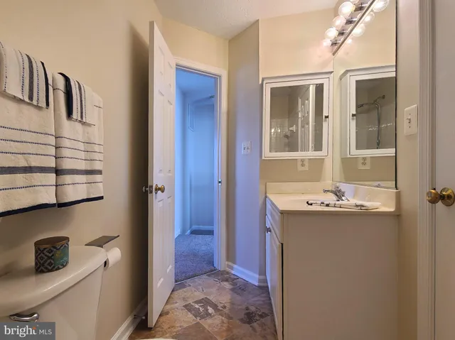 an empty room with closet area