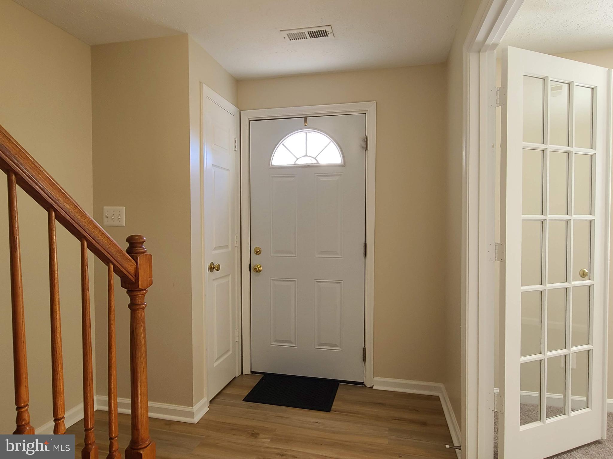 106 Regina Lane Fredericksburg, VA 22405 - Photo 2 of 31 a view of entryway with wooden floor